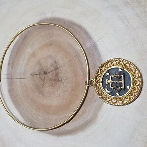 Vintage-style gold-toned Libra zodiac pendant on a Gold Tone Choker